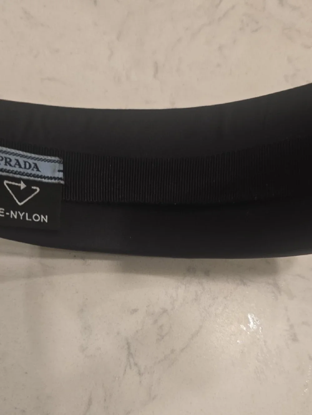 Prada Black Headband with Silver Triangular Logo